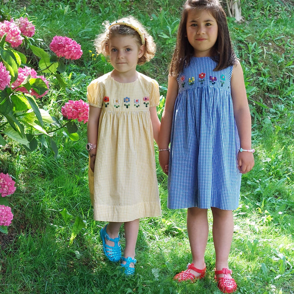 The yellow dress is Palloncino Flowers MC dress